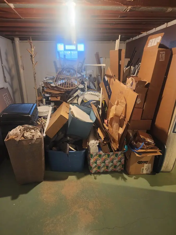 Roll-off dumpster container at job site for 20 Yard Dumpster Rental in Marble Falls